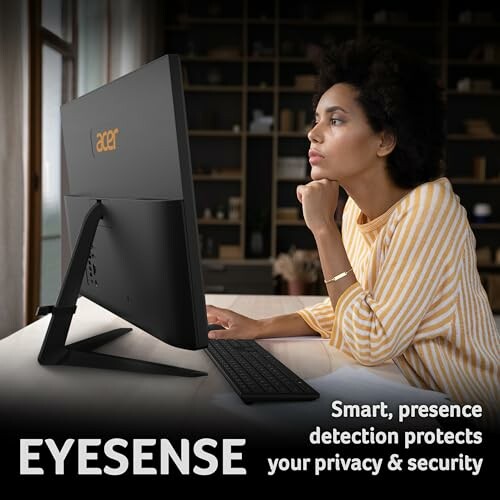 Person using Acer monitor with Eyesense technology for privacy and security.