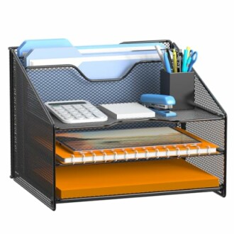 Desk organizer with office supplies, including files, pens, and a stapler.