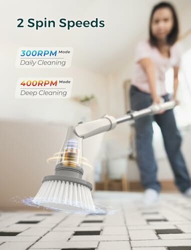 Person using electric spin scrubber on tiled floor with two speed modes.