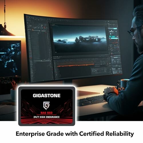 Person editing video on curved monitor with Gigastone NAS SSD advertisement.