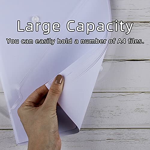 Hand holding a large capacity A4 file organizer for easy document retrieval