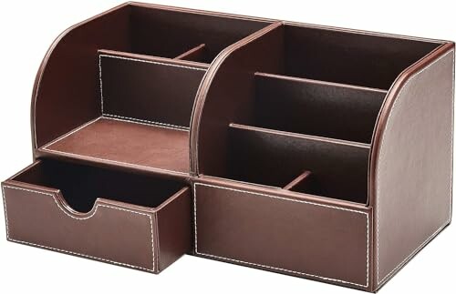 Brown leather desk organizer with multiple compartments and drawers.