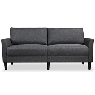 Modern dark gray sofa with clean lines and cushioned seating