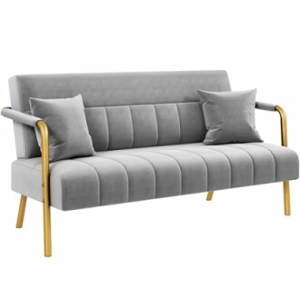 Modern gray sofa with gold legs and armrests, two cushions.