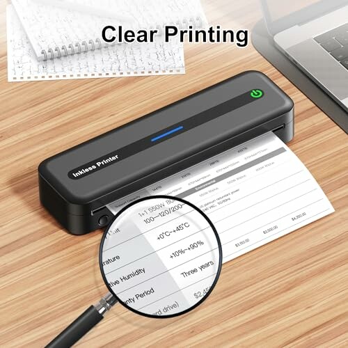 Portable printer showing clear printing on paper with a magnifying glass highlighting details.