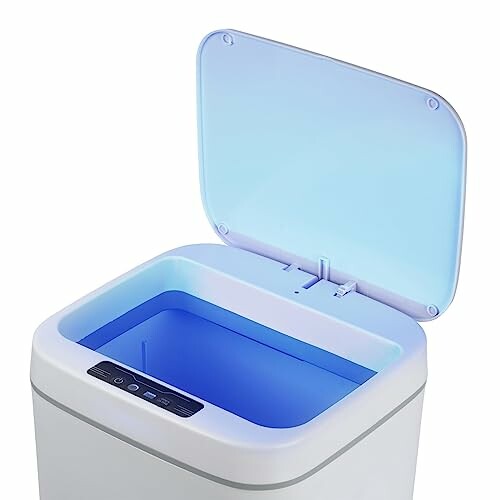 Open sensor trash can with blue interior lighting.