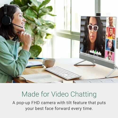 Person video chatting on a computer with multiple people on screen.